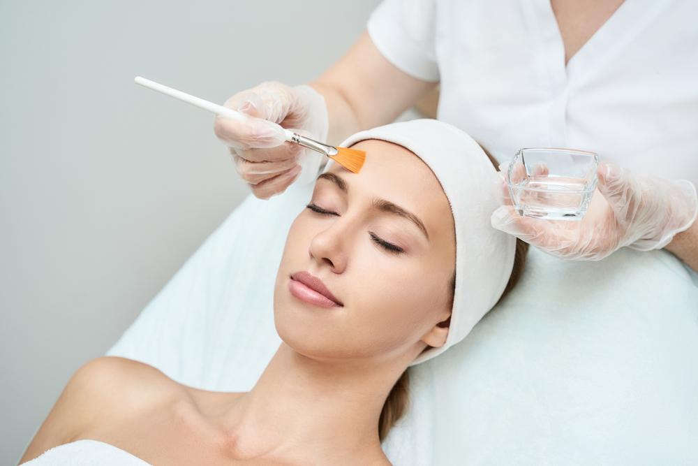a client receiving a chemical peel